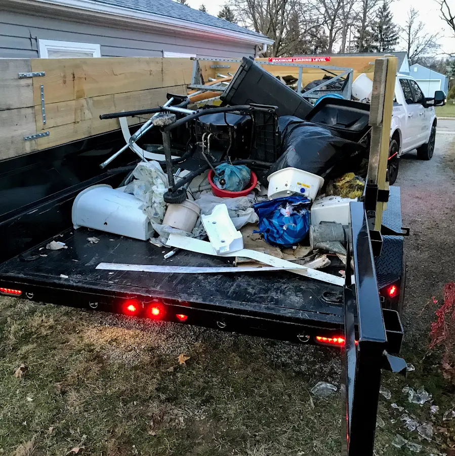 Roll-off dumpster delivered to a residential driveway in Delran